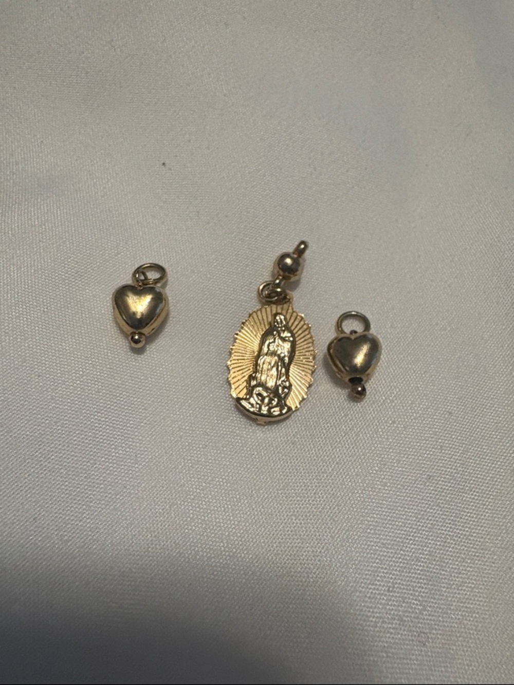 Gold-Tone Virgin Mary Pendant and Heart Charms not real gold